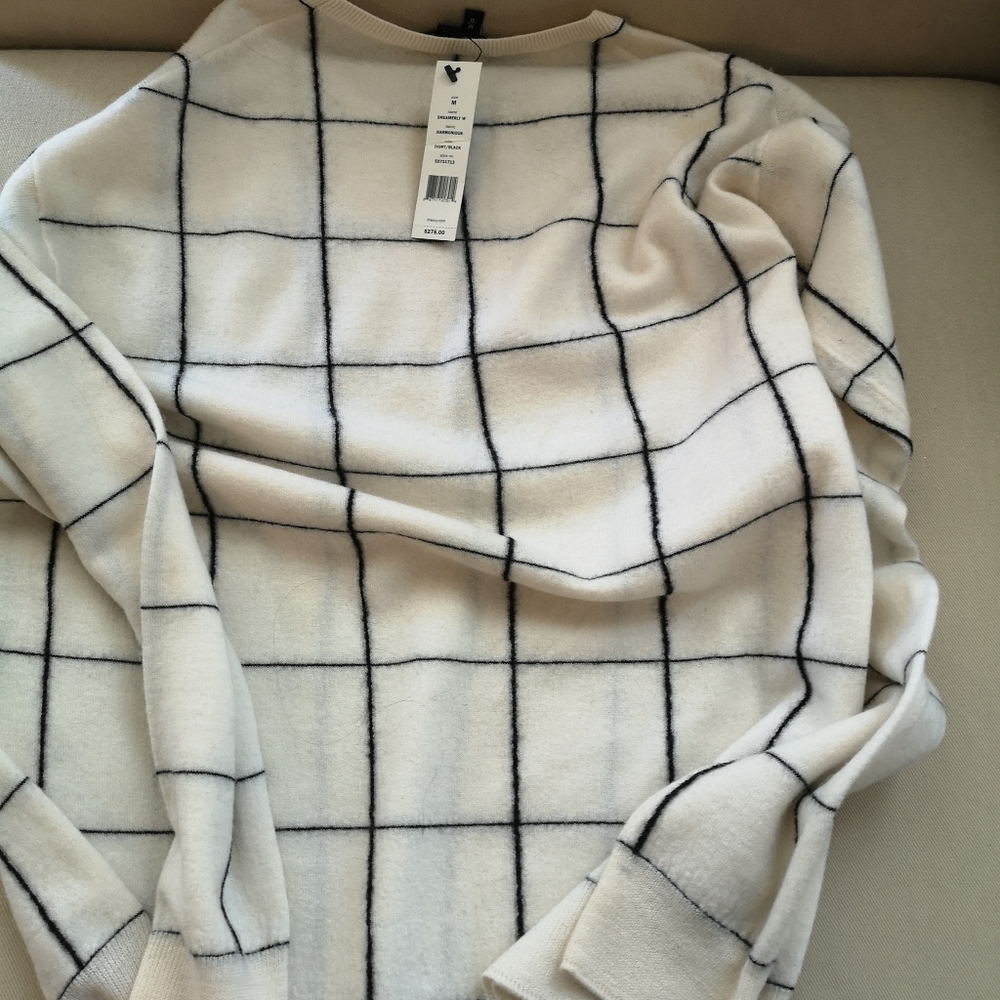 White wool sweater.